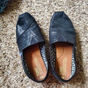 sparkly black TOMS